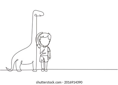 Single continuous line drawing little boy measuring his height with brontosaurus height chart on wall. Kid measures growth. Child measuring height. One line draw graphic design vector illustration