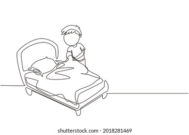 Single continuous line drawing little boy making the bed. Kids doing housework chores at home concept. Kids routine after waking up to tidy up the bed. One line draw graphic design vector illustration