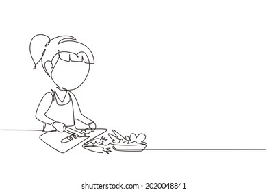 Single continuous line drawing little girl is cutting carrot and other fresh vegetables. Smiling child is enjoying cooking at home to help mother. One line draw graphic design vector illustration