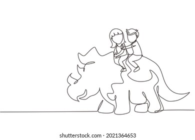 Single continuous line drawing little boy and girl caveman riding triceratops together. Kids sitting on back of dinosaur. Stone age children. Ancient human life. One line draw graphic design vector