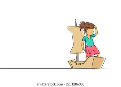 Single continuous line drawing little girl playing sailor with boat made of cardboard box. Creative kid character playing ship made of cardboard boxes. One line draw graphic design vector illustration