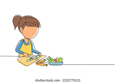 Single continuous line drawing little girl is cutting carrot and other fresh vegetables. Smiling child is enjoying cooking at home to help mother. One line draw graphic design vector illustration