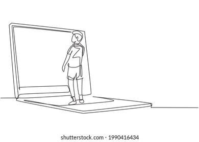 Single continuous line drawing male junior high school student writing on giant laptop screen like he was writing on whiteboard. Learning concept. One line draw graphic design vector illustration