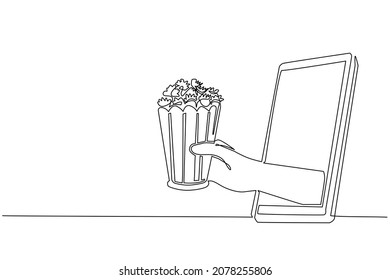 Single continuous line drawing male hand holding popcorn through mobile phone. Concept of cinema restaurant order delivery online food. Application for smartphones. One line draw design graphic vector