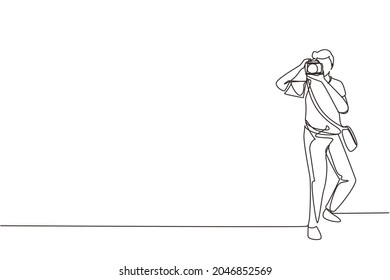 Single continuous line drawing man with camera and sling bag taking pictures. Paparazzi or journalist occupation, digital photography hobby. Dynamic one line draw graphic design vector illustration