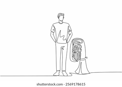 Single continuous line drawing a man in casual clothes standing next to a tuba. Preparation before entertaining the pedestrians. The musician. National Tuba Day. One line design vector illustration