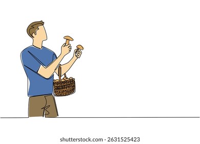 Single continuous line drawing a man holds mushrooms and rattan basket filled with mushrooms slung over hand. Harvest abundantly. National Mushroom Hunting Day. One line design vector illustration