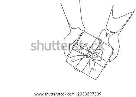 Single continuous line drawing man's hands holding kraft gift box tied with ribbon. Top view, holiday concept. Birthday greeting cards design. Dynamic one line draw graphic design vector illustration