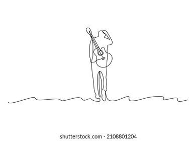 Single continuous line drawing of a musician carrying guitar - Modern one line draw design vector illustration 