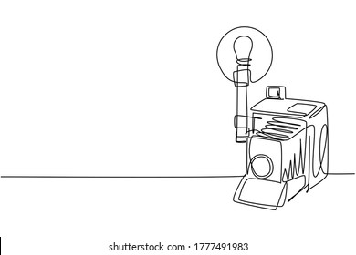 Single continuous line drawing of old retro analog camera medium format with blitz flash light. Vintage photography equipment concept one line draw design vector graphic illustration