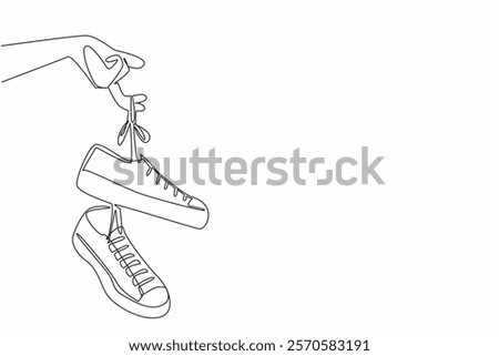 Single continuous line drawing a pair of sneakers with laces hanging from the fingers. Easy to carry. Attracts attention. National Two Different Colored Shoes Day. One line design vector illustration