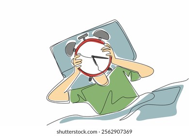 Single continuous line drawing person lying on bed holding alarm clock and covering his head. The organ of body systems work at certain hours. Biological Clock Day. One line design vector illustration