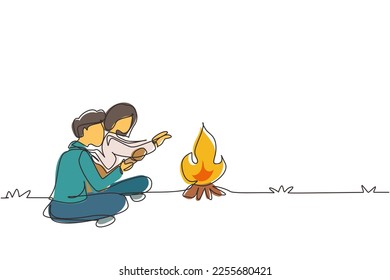 Single continuous line drawing romantic couple camping around campfire tents. Man woman warm their hands near bonfire sitting on ground. Nature trip. One line draw graphic design vector illustration