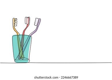 Single continuous line drawing several toothbrushes in glass. Dental care equipment at home. Brushing teeth. Teeth care concept. Oral care center. One line draw graphic design vector illustration
