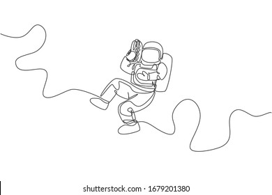 Single continuous line drawing of spaceman holding and eating delicious hot dog in nebula galaxy. Fantasy fiction of outer space life concept. Trendy one line draw graphic design vector illustration