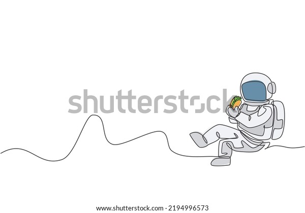 Single continuous line drawing of spaceman\
sitting relax on moon surface and eating delicious Mexican taco.\
Fantasy fiction of outer space life concept. Trendy one line draw\
design vector\
illustration