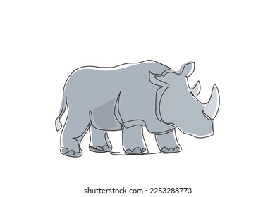 Single continuous line drawing strong rhinoceros for conservation national park logo identity. African rhino animal mascot for national zoo safari. One line draw graphic design vector illustration