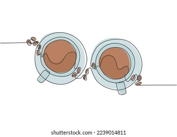 Single continuous line drawing of two cups of coffee with coffee beans and leaf from top view. Coffee drink concept display for coffee shop. One line draw design illustration