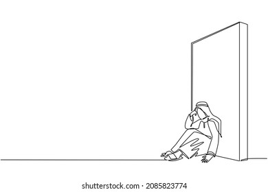 Un solo dibujo de línea continua molesta a un empresario árabe sentado en el suelo y se inclina contra la pared. Concepto de negocio en fracaso, triste, solitario, quiebra o expresión negativa. vector de diseño de trazos de una línea