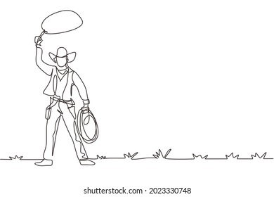 Single continuous line drawing western cowboy standing and throwing lasso and wild west elements. Man with cowboy hat and lasso at desert. Dynamic one line draw graphic design vector illustration