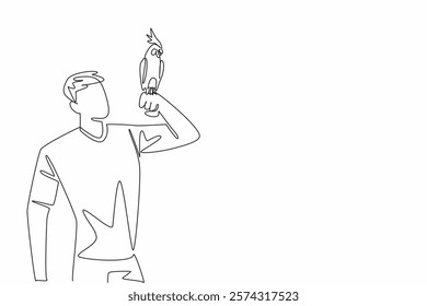 Single continuous line drawing white cockatiel bird perched on hand of man. Birds resulting from genetic mutations. The little crested parrot. Man Holding Bird. One line design vector illustration