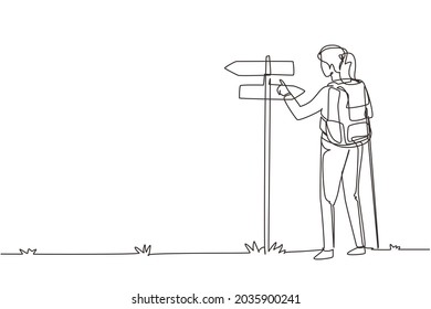 Single continuous line drawing woman hiker standing near direction sign or pointer. Girl with backpacks searching for location. Gets lost on nature. One line draw graphic design vector illustration