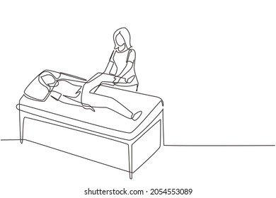 Single Continuous Line Drawing Woman Lying On Massage Table Professional Masseur Therapist Doing Healing Treatment Massaging Patient Treating Knee Manual Physical Therapy. One Line Draw Design Vector