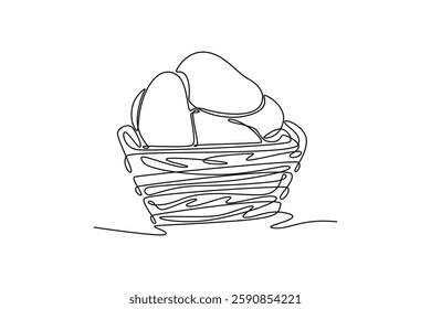 Single continuous line drawing wooden basket with full of fresh mango fruit for groceries logo. Healthy food contains vitamin for diet program. Dynamic one line draw graphic design vector illustration