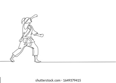 Single continuous line drawing of young confident karateka girl in kimono practicing karate combat at dojo. Martial art sport training concept. Trendy one line draw graphic design vector illustration