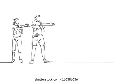 Single continuous line drawing of young sportive man and woman training warm up together in sport gymnasium club center. Fitness stretching concept. Trendy one line draw design vector illustration