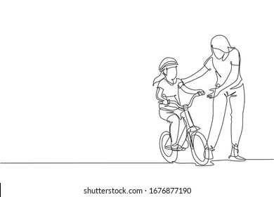 Single continuous line drawing of young kids girl learning ride bicycle with mother at outdoor park. Parenthood lesson. Family time concept. Trendy one line draw design vector illustration graphic