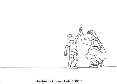 Single continuous line drawing of young Arabian boy give high five gesture to his dad, happy parenting. Islamic muslim family care, fatherhood concept. Trendy one line draw design vector illustration