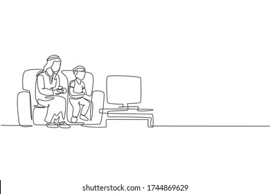 Single continuous line drawing of young Arabian father playing console game at home together with son. Islamic muslim happy family fatherood concept. Trendy one line draw design vector illustration