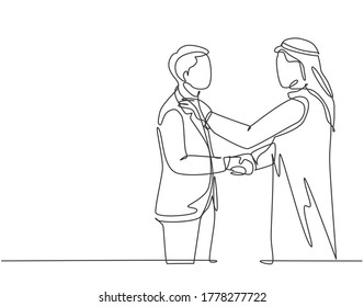 Single continuous line drawing of young muslim businessman congratulate his new employee. Arab middle east businessmen with shmagh, kandura, thawb, robe cloth. One line draw design vector illustration