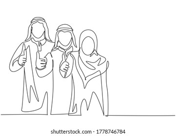 Single continuous line drawing of young muslim male and female marketing managers giving thumbs up gestures. Arab middle east cloth shmagh, kandura, thawb. One line draw design vector illustration