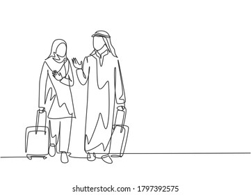 Single continuous line drawing of young male and female muslim managers talking after do business trip abroad. Arab middle east cloth kandura, thawb, hijab. One line draw design vector illustration