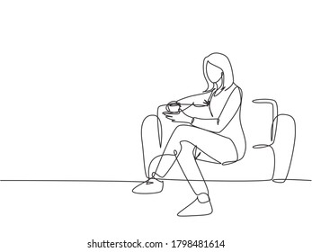 Single continuous line drawing of young female worker get relax by sitting on the sofa while holding a cup of coffee drink. Drinking tea concept one line draw graphic design vector illustration