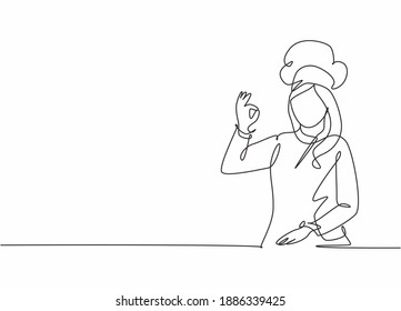 Single continuous line drawing of young excited beauty attractive female chef pose standing and giving okay gesture. Restaurant banner concept one line drawing design vector graphic illustration