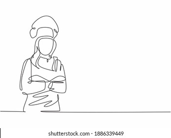 Single continuous line drawing of  young confident beauty female chef in uniform pose standing and crossing arm in chest. Resto banner model concept one line drawing design vector graphic illustration