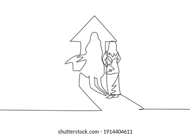 Single continuous line drawing of young beauty Arabian manager facing her superhero shadow on the wall. Professional businesswoman. Minimalism concept one line draw graphic design vector illustration