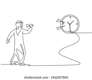 Single continuous line drawing young Arab business man hit the analog clock on wall with dart arrow. Focus target business metaphor concept. Dynamic one line draw graphic design vector illustration.