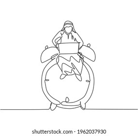 Single continuous line drawing young Arab business man sitting on big analog alarm clock and typing on laptop. Business discipline metaphor concept. One line draw graphic design vector illustration.