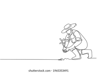 Single continuous line drawing young male farmer planting plant shoots in the ground. Start the planting period. Minimalism metaphor concept. Dynamic one line draw graphic design vector illustration.