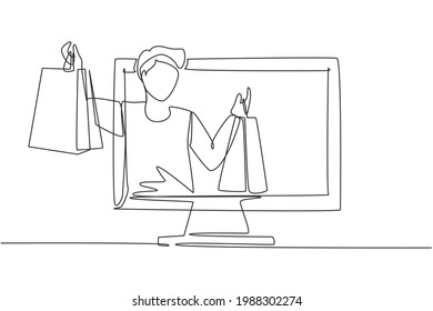 Single continuous line drawing young man coming out of monitor screen holding shopping bags. Sale, digital lifestyle and consumerism concept. Dynamic one line draw graphic design vector illustration