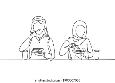 Single continuous line drawing young Arab couple husband and wife having meal around table. Celebrate wedding anniversary with romantic dinner. Dynamic one line draw graphic design vector illustration