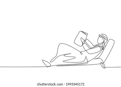 Single continuous line drawing young Arab man reading, learning and laying down on recliner sofa. Literature fans or lovers. Education concept. Dynamic one line draw graphic design vector illustration