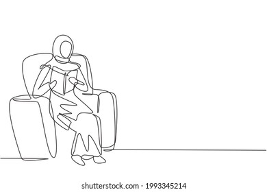Single continuous line drawing young Arabian female reading, learning and sitting on sofa. Literature lovers. Smart student, education concept. Dynamic one line draw graphic design vector illustration