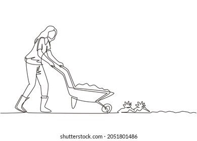 Single continuous line drawing young girl carrying wheelbarrow with plants and flowers outdoor. Home hobby. Garden work. Florist taking care of plant. One line draw design graphic vector illustration