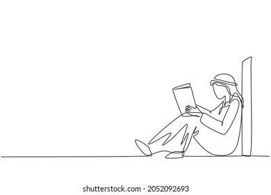 Single continuous line drawing young Arab man sit on floor, reclined on wall of library, read book. Guy studying and reading textbook. Reader sitting on floor and learning. One line draw design vector