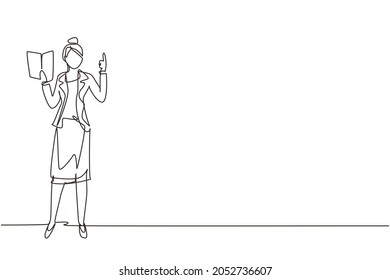 Single continuous line drawing young woman professor standing in front of class with book on her hands, female teacher students in classroom at school. One line draw graphic design vector illustration